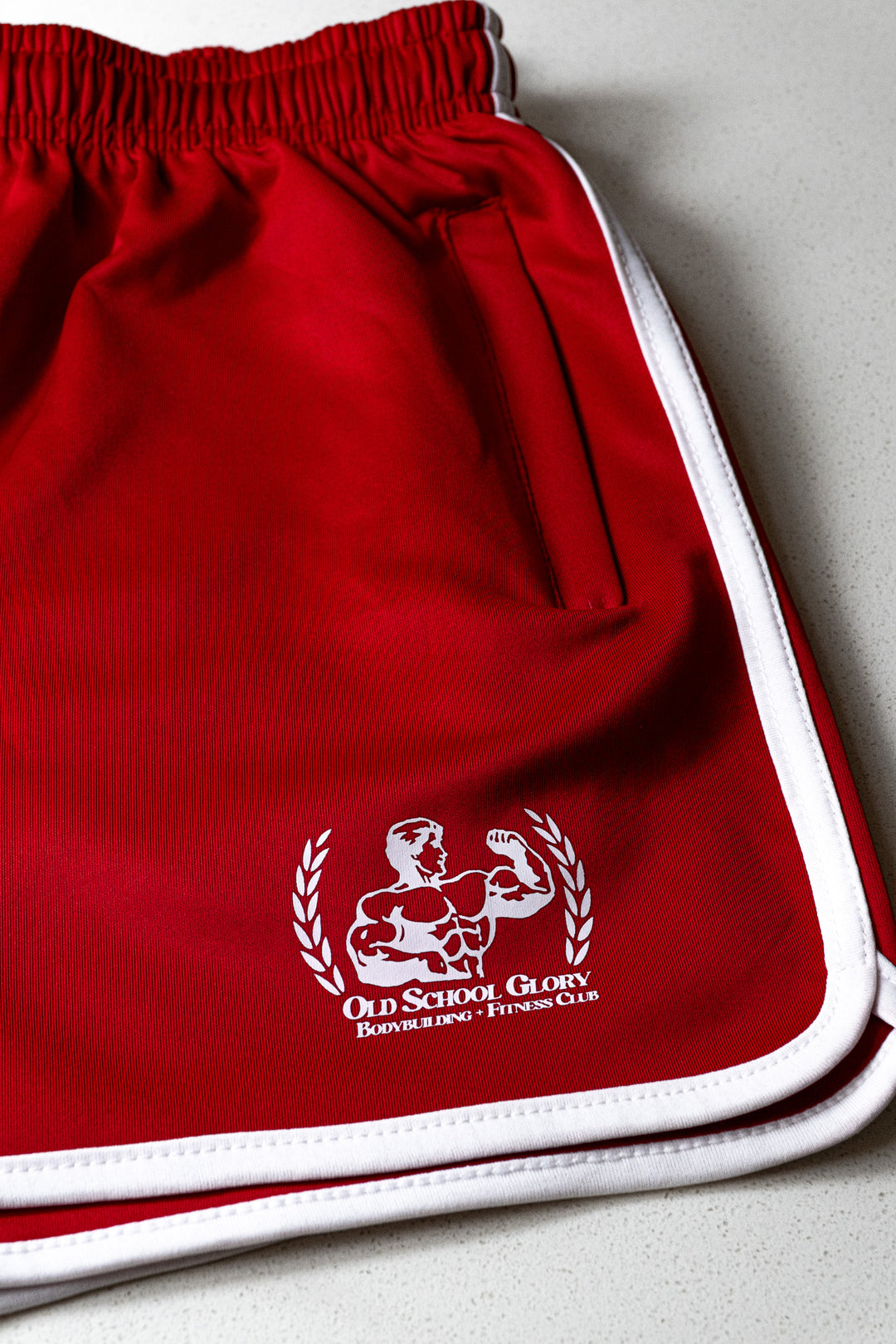 RED STRIPED GYM SHORTS