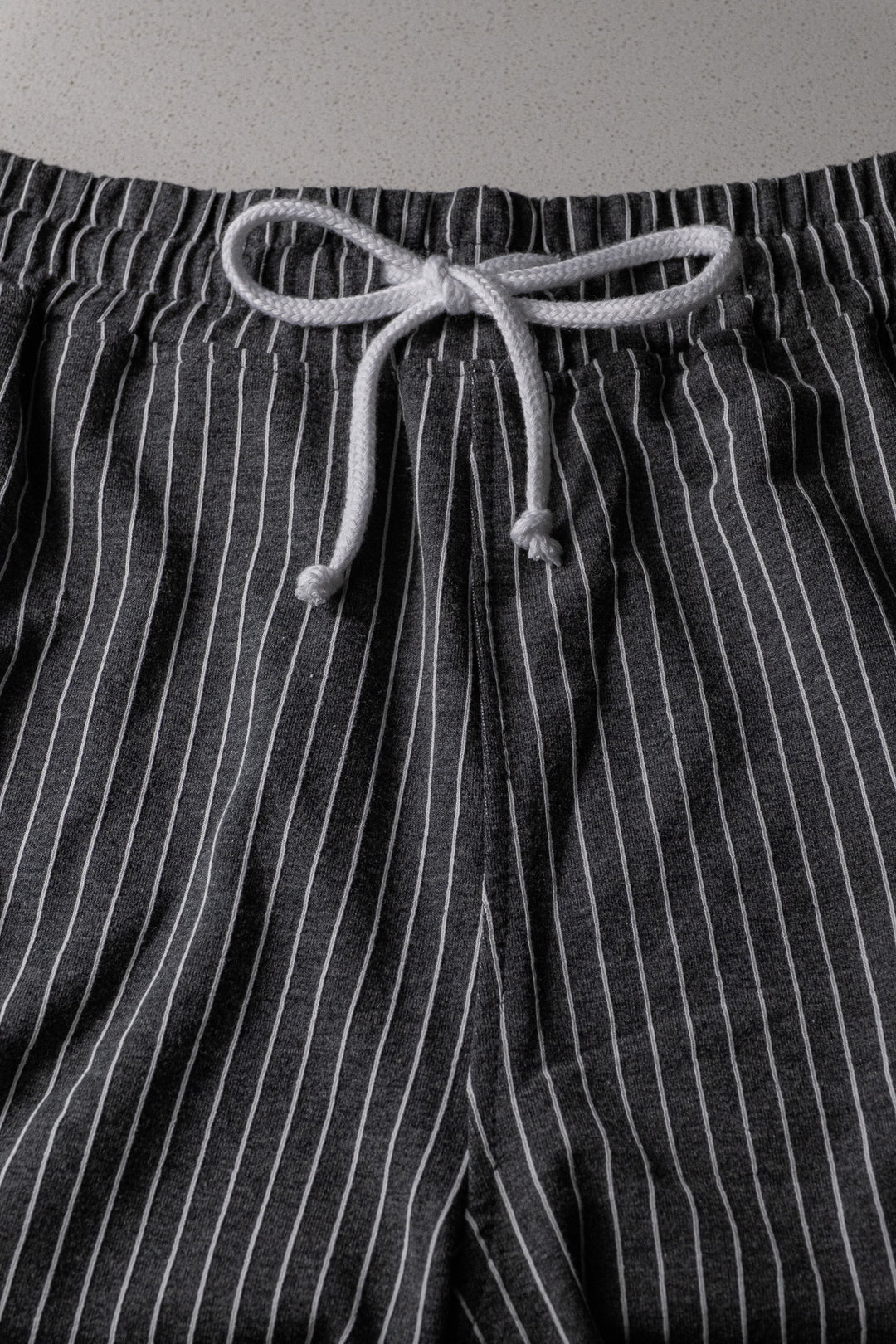 STORM PIN-STRIPED GYM SHORTS