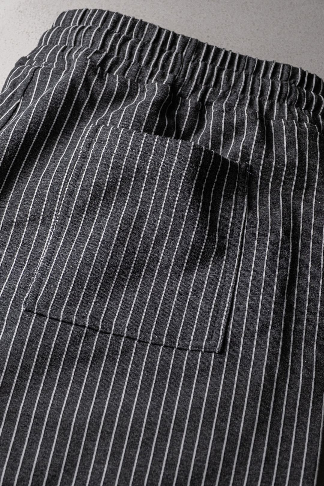 STORM PIN-STRIPED GYM SHORTS