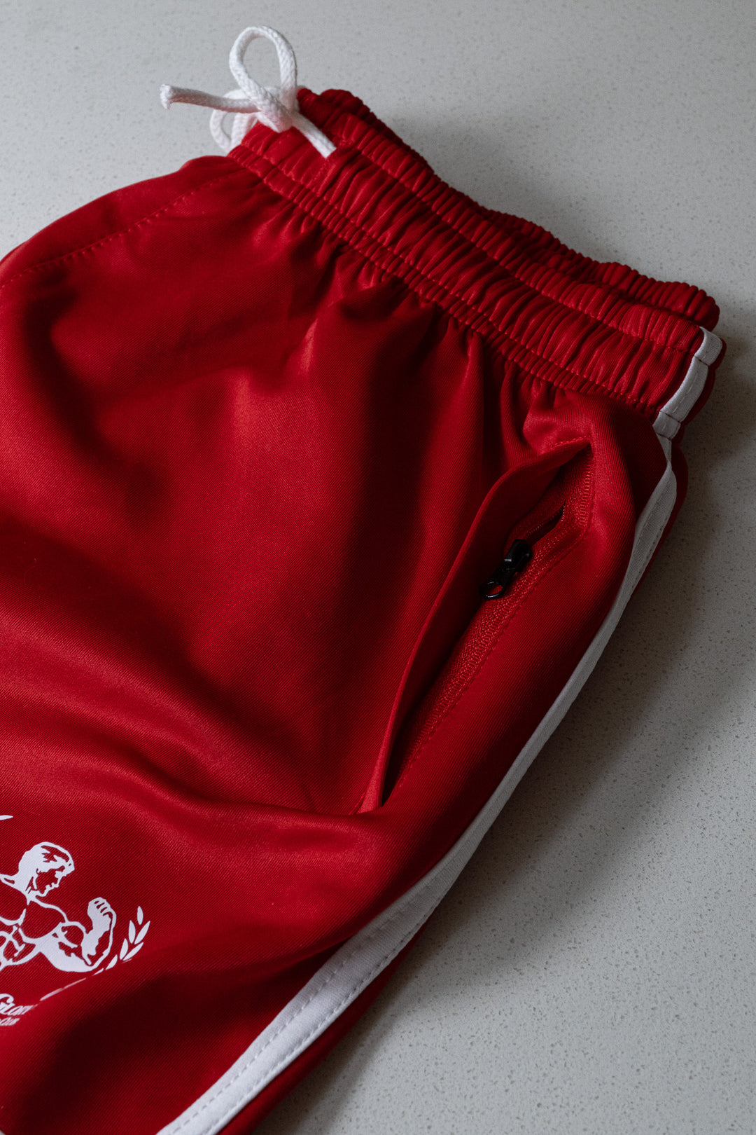 RED STRIPED GYM SHORTS