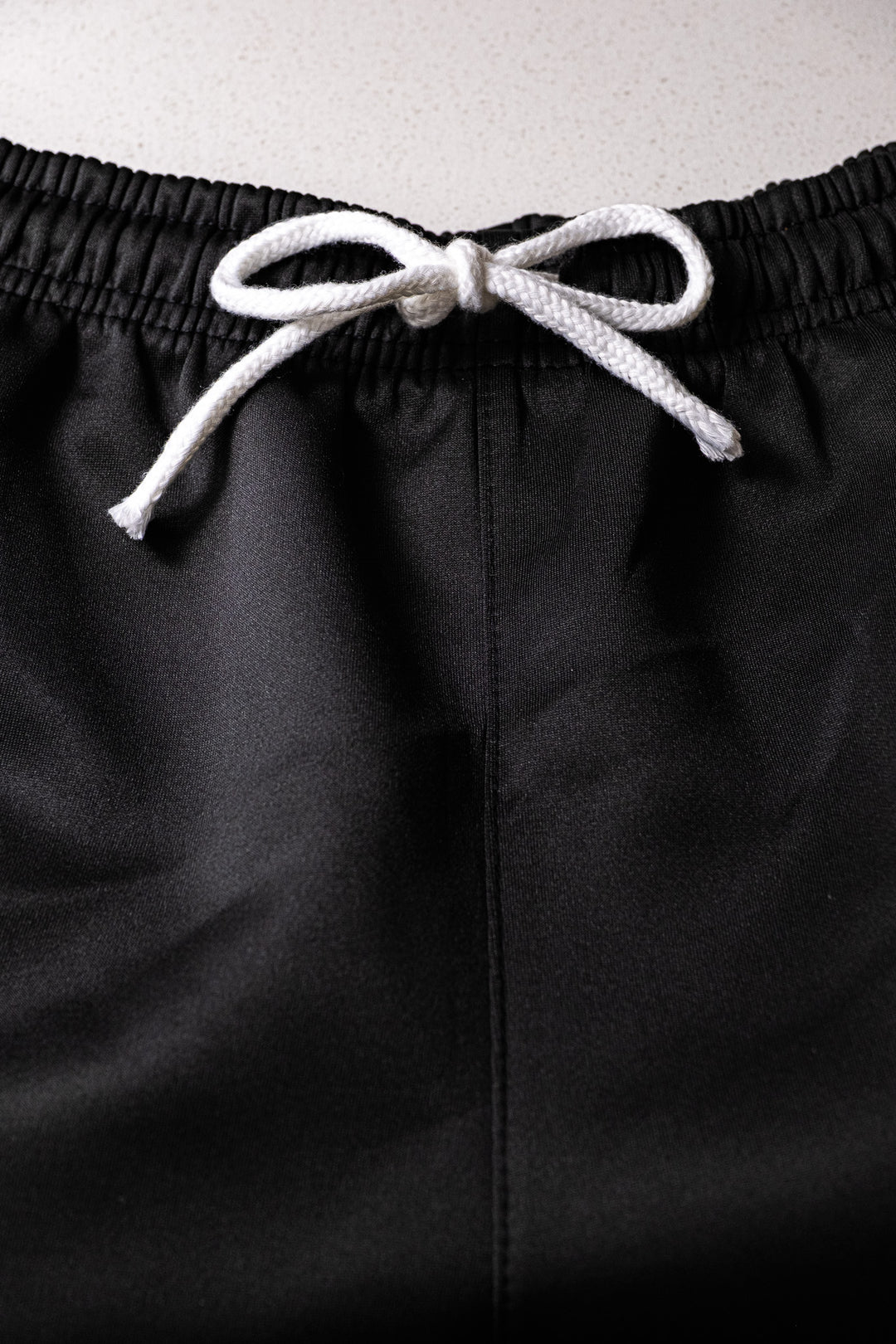 BLACK STRIPED GYM SHORTS