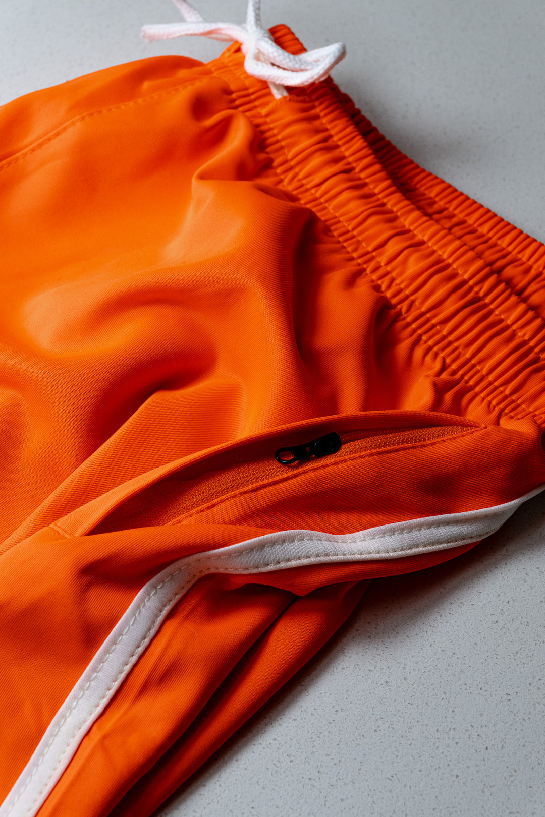 ORANGE STRIPED OLD SCHOOL GYM SHORTS