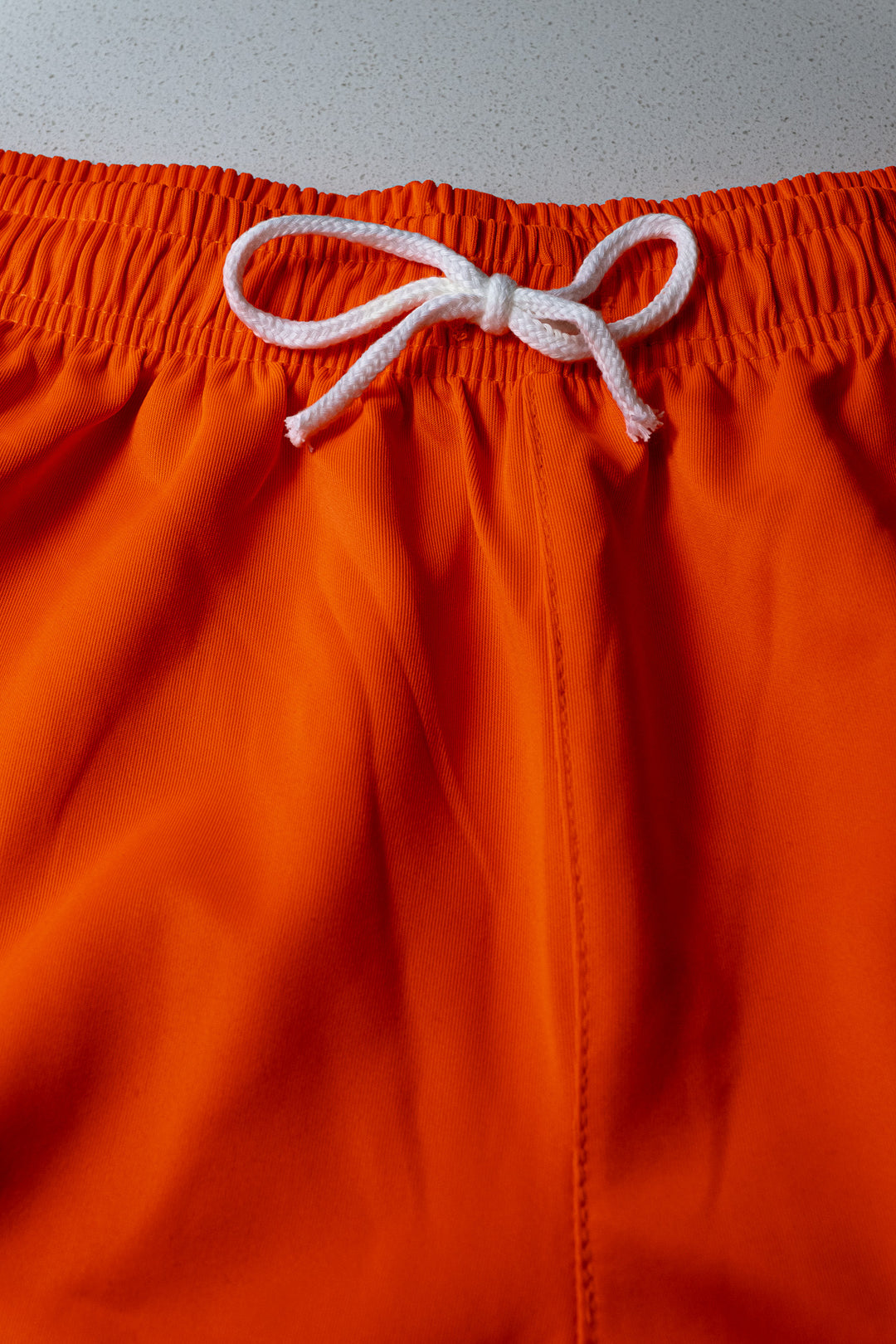ORANGE STRIPED OLD SCHOOL GYM SHORTS