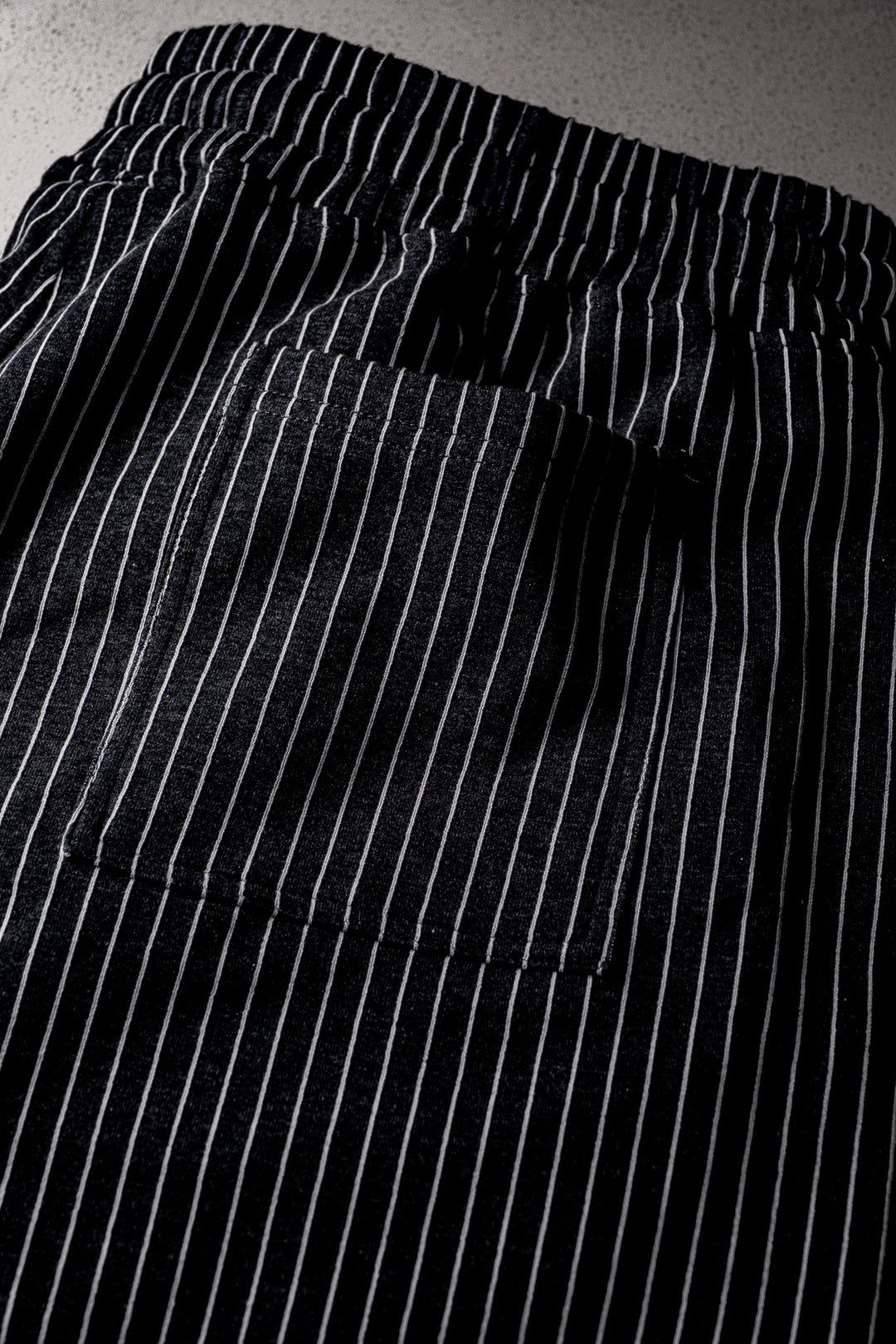 BLACK PIN-STRIPED GYM SHORTS