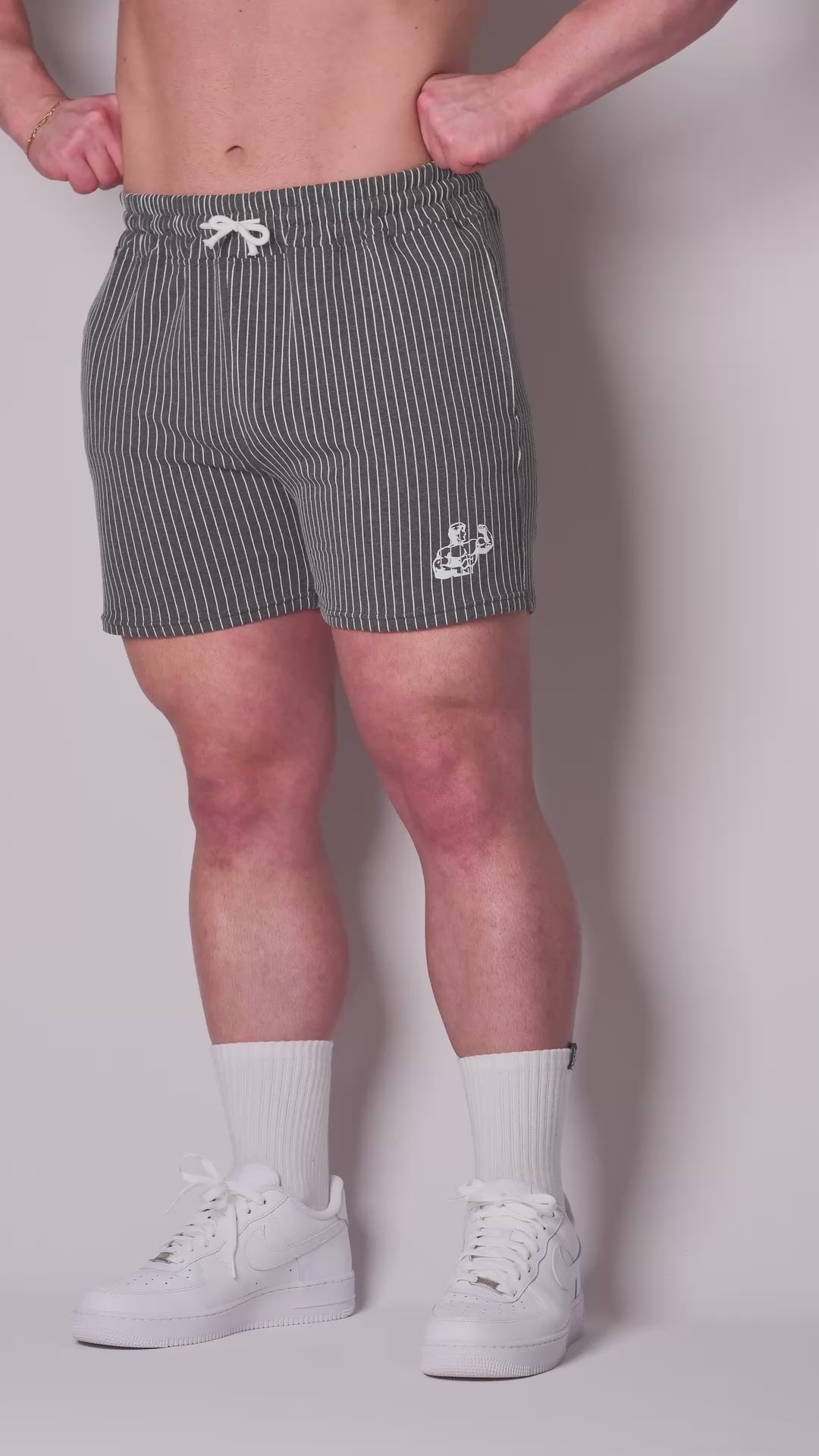 ROSE PIN-STRIPED GYM SHORTS